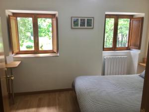 Posteľ alebo postele v izbe v ubytovaní Casa Rural La Casita del Río