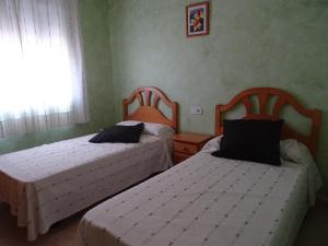 Postel nebo postele na pokoji v ubytování Morena + 8 fotografií
