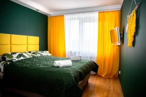 Posteľ alebo postele v izbe v ubytovaní Apartament Panorama 2 18