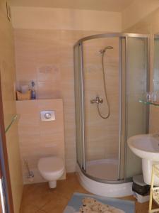 Kúpeľňa v ubytovaní Apartament z Ogródkiem