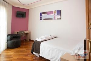 TV a/nebo společenská místnost v ubytování HOLIDAYS MIRANA