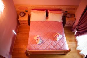 Postel nebo postele na pokoji v ubytování Agriturismo Grammelot