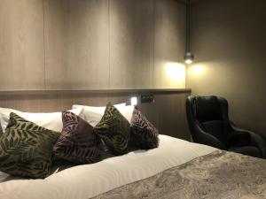 Letto o letti in una camera di Hotel Grand View Takasaki