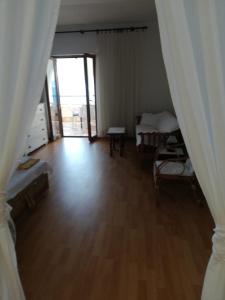 Postel nebo postele na pokoji v ubytování Apartments Alexa