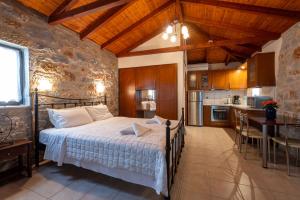 Kuchyň nebo kuchyňský kout v ubytování Myrto Villas