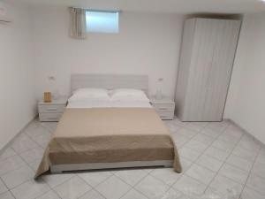 Postel nebo postele na pokoji v ubytování AMAA CASA
