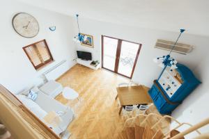 Televízia a/alebo spoločenská miestnosť v ubytovaní Hello Crikvenica Apartment