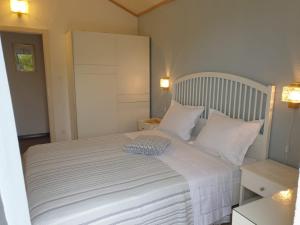 Postel nebo postele na pokoji v ubytování Apartments Kuzmanic