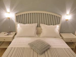 Postel nebo postele na pokoji v ubytování Apartments Kuzmanic