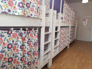 Posteľ alebo postele v izbe v ubytovaní Lorf Hostel&Coffee