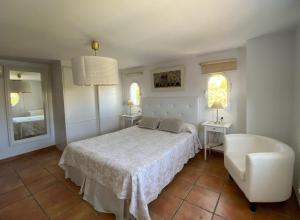 Postel nebo postele na pokoji v ubytování Villa las Tinajas Luxury