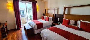 Postel nebo postele na pokoji v ubytování Hotel Boutique Casa San Diego