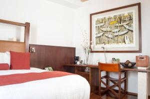 Postel nebo postele na pokoji v ubytování Hotel Boutique Casa San Diego