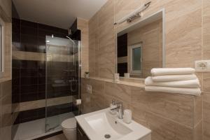 Kúpeľňa v ubytovaní Apartments Villa Hadria