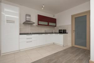 Kuchyňa alebo kuchynka v ubytovaní Apartments Villa Hadria