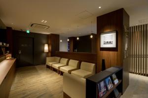 TV a/nebo společenská místnost v ubytování First Cabin Akasaka