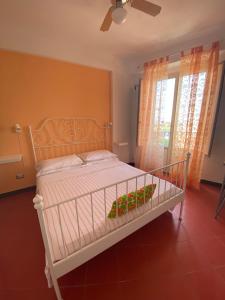 Кровать или кровати в номере Taormina’s Sun