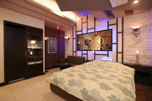 Voodi või voodid majutusasutuse Hotel JD Utsunomiya (Adult Only) toas