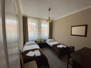 Postel nebo postele na pokoji v ubytování Hotel Morze