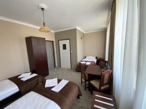 Postel nebo postele na pokoji v ubytování Hotel Morze