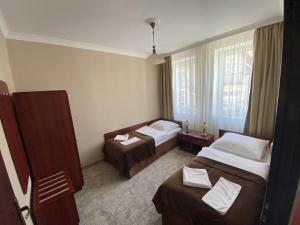 Postel nebo postele na pokoji v ubytování Hotel Morze