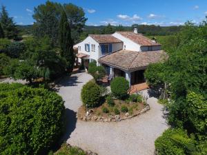 an aerial view of a house with a garden at L' Esmerand in Cotignac