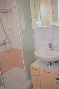 Koupelna v ubytování Apartments Janja