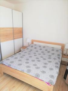 Postel nebo postele na pokoji v ubytování Apartments Janja