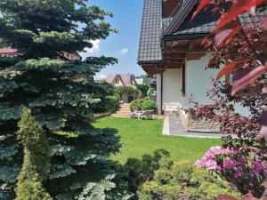 Vonkajšia záhrada v ubytovaní Domek Deluxe Resort Willa Adrian