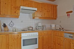 Kuchyň nebo kuchyňský kout v ubytování Ferienhaus Aurora