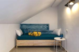 Postel nebo postele na pokoji v ubytování ÁTICO ALTEA BLANCA