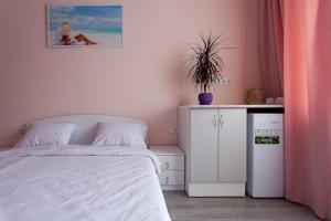 Postel nebo postele na pokoji v ubytování Flamingo Family Club
