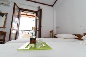 Postel nebo postele na pokoji v ubytování Melissa Rooms Naxos