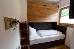 Łóżko lub łóżka w pokoju w obiekcie Olympia-Relax-Hotel Leonhard Stock