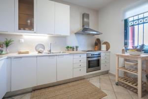 A kitchen or kitchenette at Acroyali Beach House