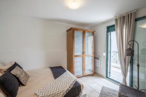 A bed or beds in a room at Acroyali Beach House