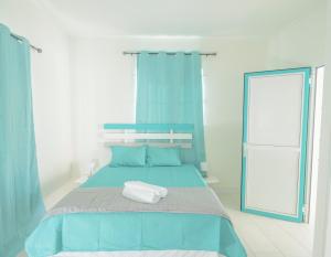 Letto o letti in una camera di Abiki Mauritius