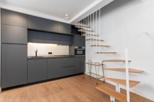 A kitchen or kitchenette at Be Mate Málaga Centro