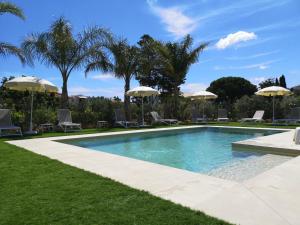 The swimming pool at or close to Residence I Faraglioni