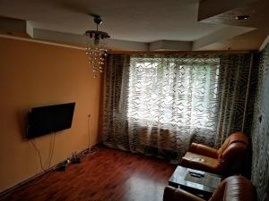 TV/trung tâm giải trí tại Airport Apartments