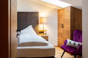 Łóżko lub łóżka w pokoju w obiekcie Olympia-Relax-Hotel Leonhard Stock