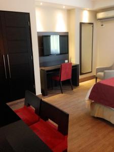 Tempat tidur dalam kamar di Hotel Principe