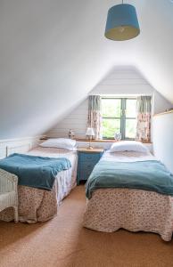 Katil atau katil-katil dalam bilik di The Old Farm