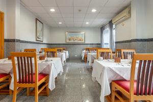 En restaurant eller et andet spisested på Residencial Horizonte