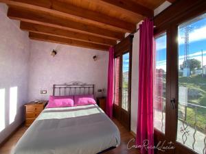 Cama ou camas em um quarto em Casa rural Lucia
