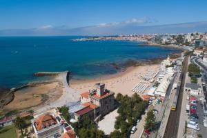 an aerial view of a beach and the ocean at Vila Galé Estoril in Estoril