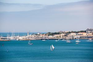 a group of boats in a large body of water at Vila Galé Estoril in Estoril