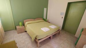 Postel nebo postele na pokoji v ubytování Coral Rubrum