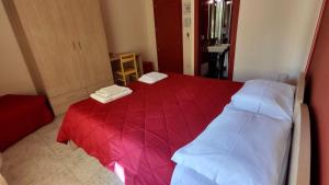 Postel nebo postele na pokoji v ubytování Coral Rubrum