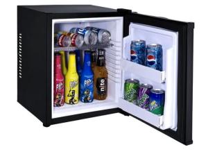 an open refrigerator with drinks and soda cans at STOP&RELAX Apartment in Liptovská Osada